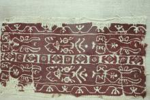 A 7th or 8th C tapestry woven cuffs attributed to Persia with various ivy and geometric designs.