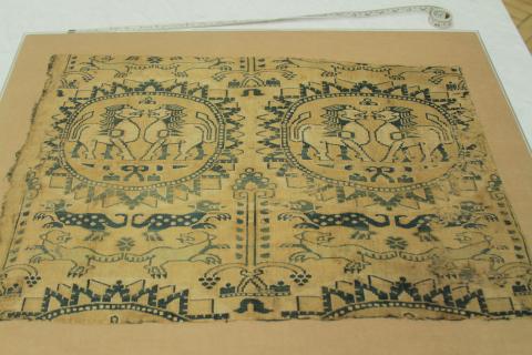 A samite silk with two winged beasts facing each other in a circle and various other motifs, see other photos for details